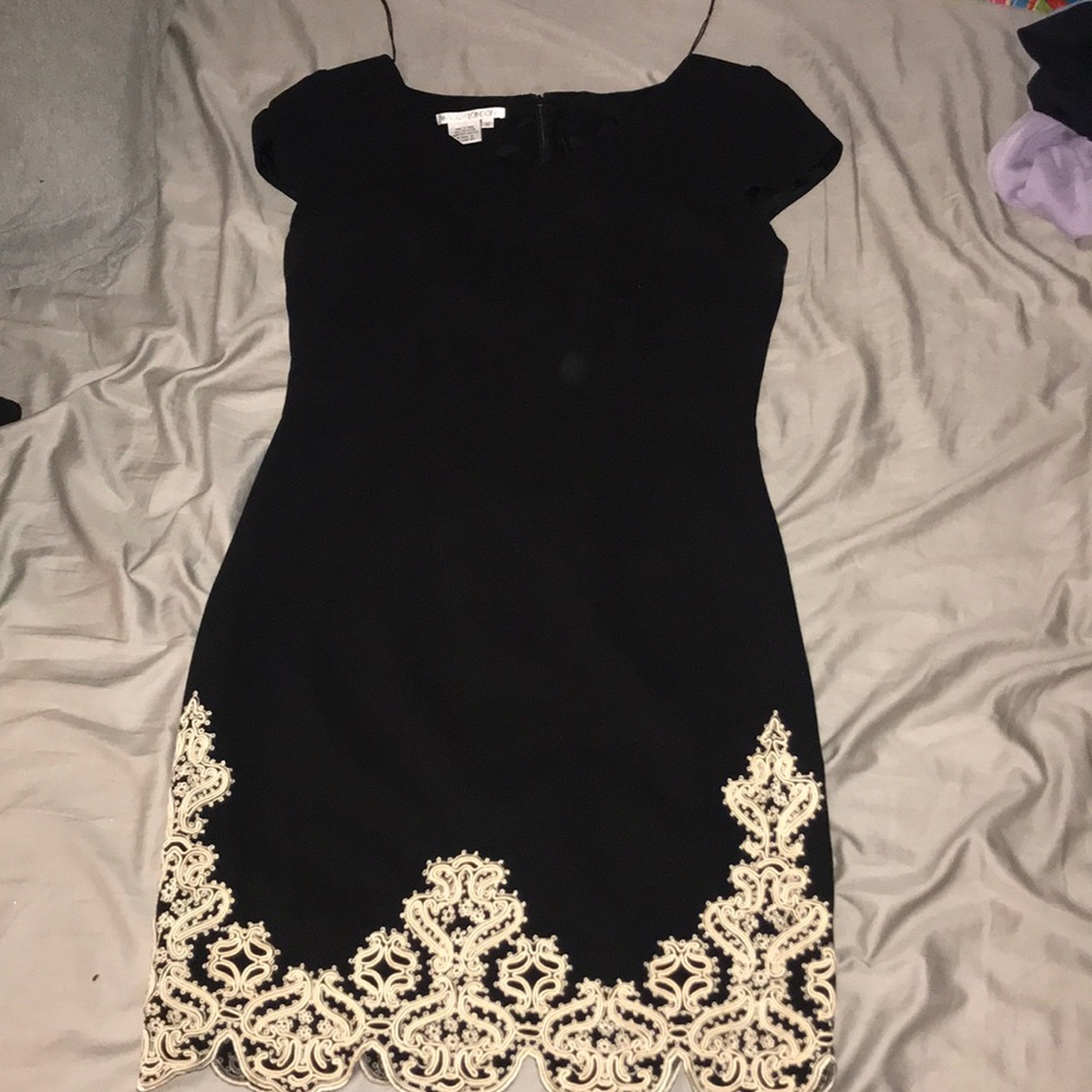 Black lined dress with Beige design